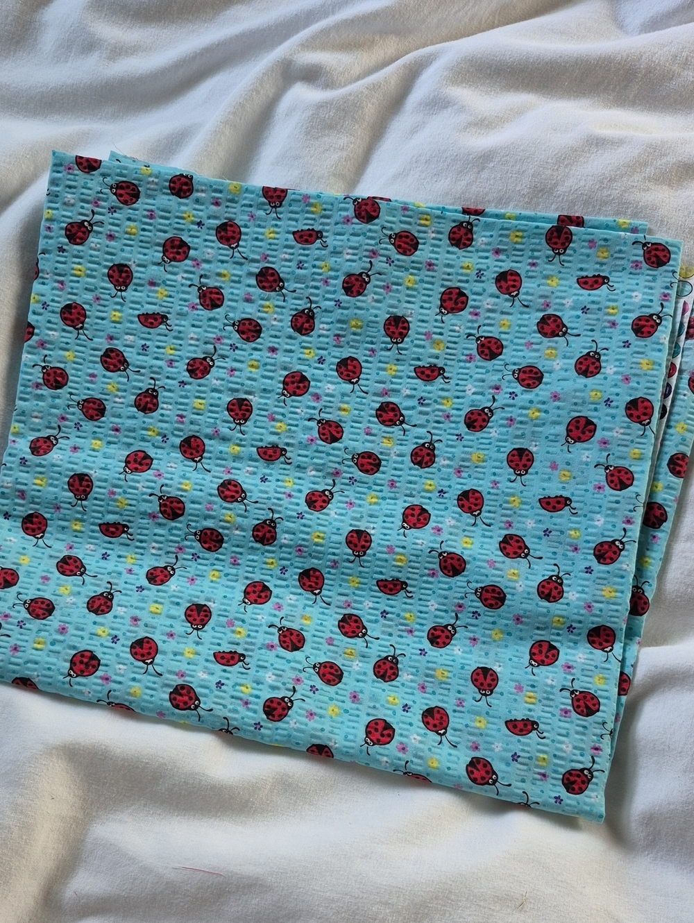 Light Blue Textured Cotton Fabric Panel with Red Ladybug Print 36"x44"